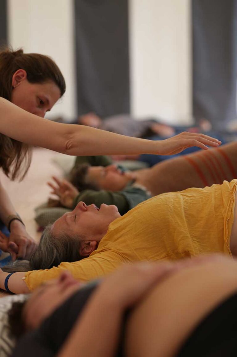 A hands-on bodywork session at BreathCamp