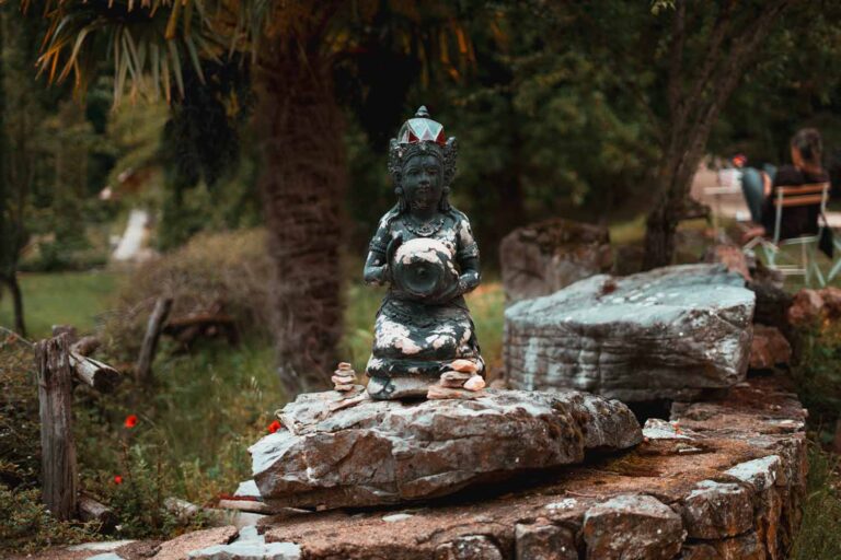 A Buddha statue on the ASHA land